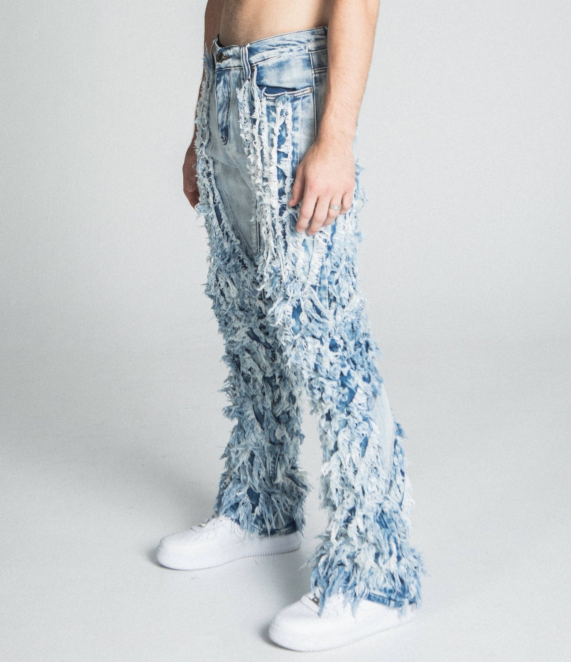 EXTREME FRAYED STACKED JEANS