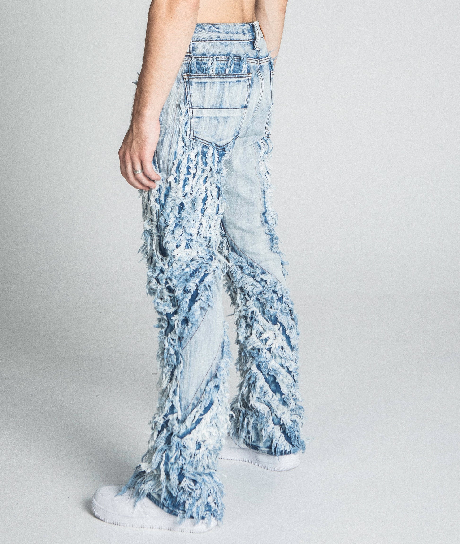 EXTREME FRAYED STACKED JEANS