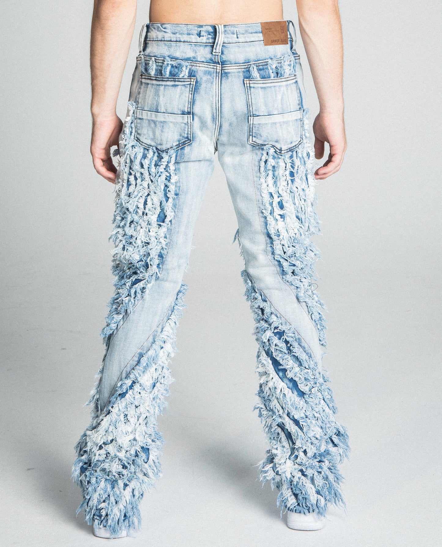 EXTREME FRAYED STACKED JEANS