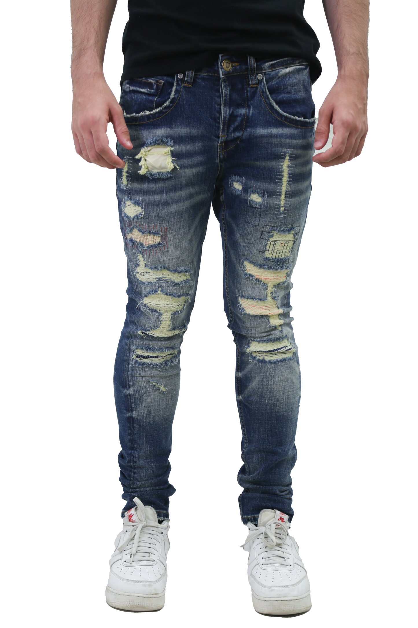 MID-RISE RIPPED SKINNY JEANS