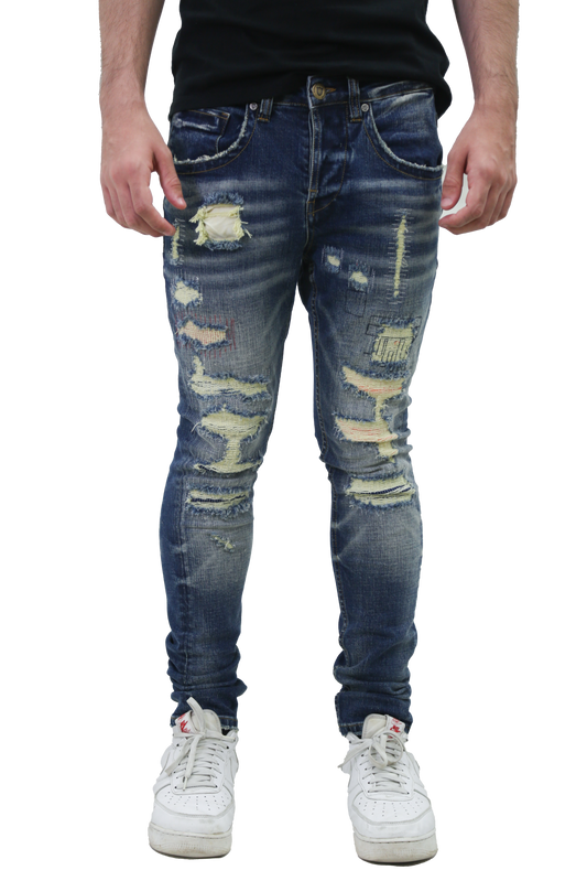 MID-RISE RIPPED SKINNY JEANS